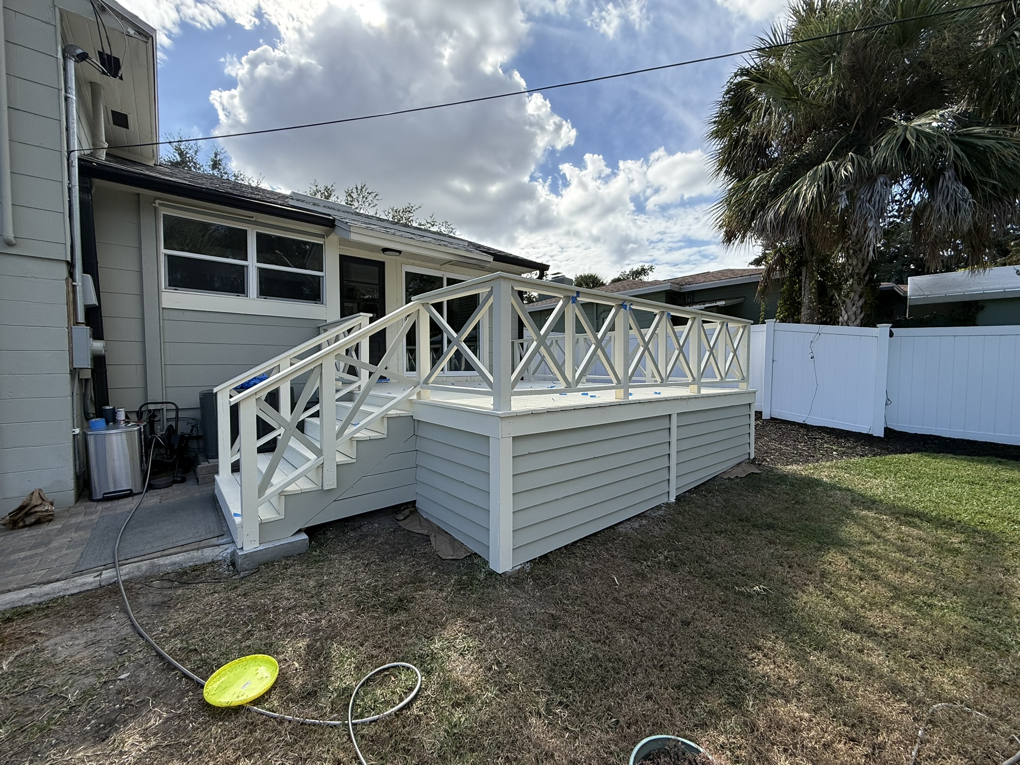 Freshly painted deck and custom railings in St. Petersburg, FL